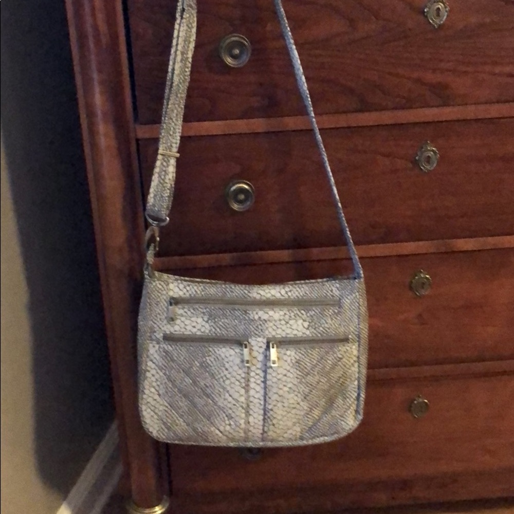 Travelon crossbody bag with RFID wristlet